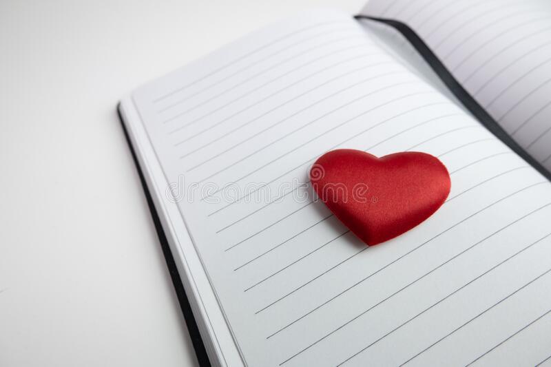 red-love-heart-blank-page-notebook-journal-close-up-red-love-heart-blank-page-notebook-journal-close-185114591.jpeg